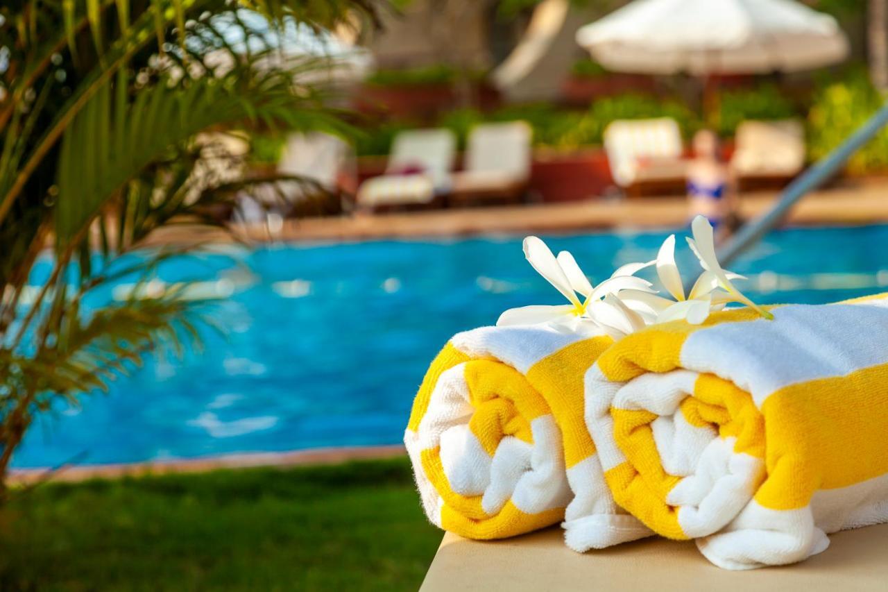 Caravela Beach Resort Varca Exteriér fotografie Pool towels